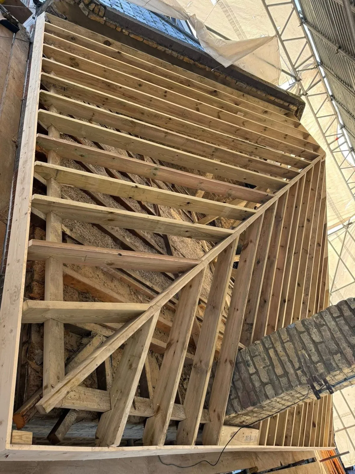 New roof timbers and rafters during a re-roof in Kingsbridge